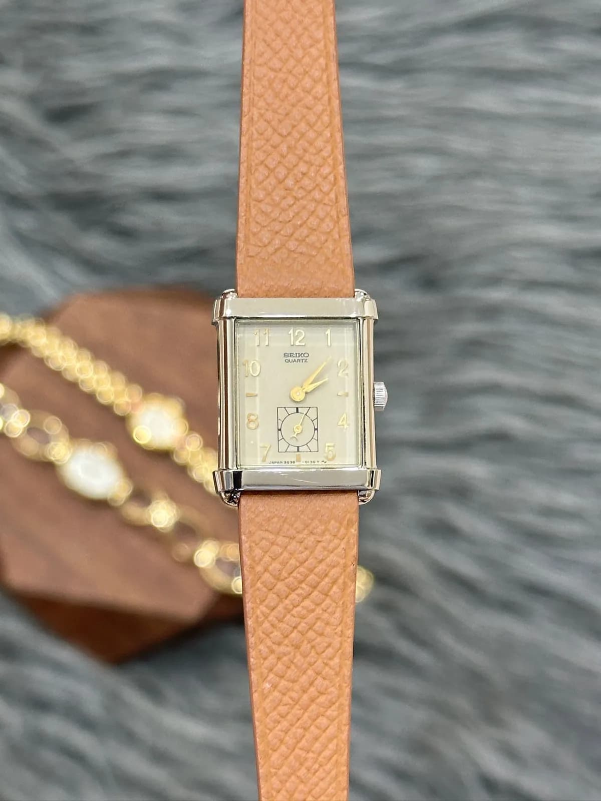 Seiko Quartz 1990s rectangular Arabic dial sub-seconds steel tan leather strap
