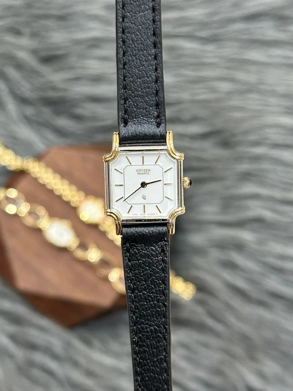 Citizen Quartz 1980s octagonal white dial two-tone case black Swift leather strap